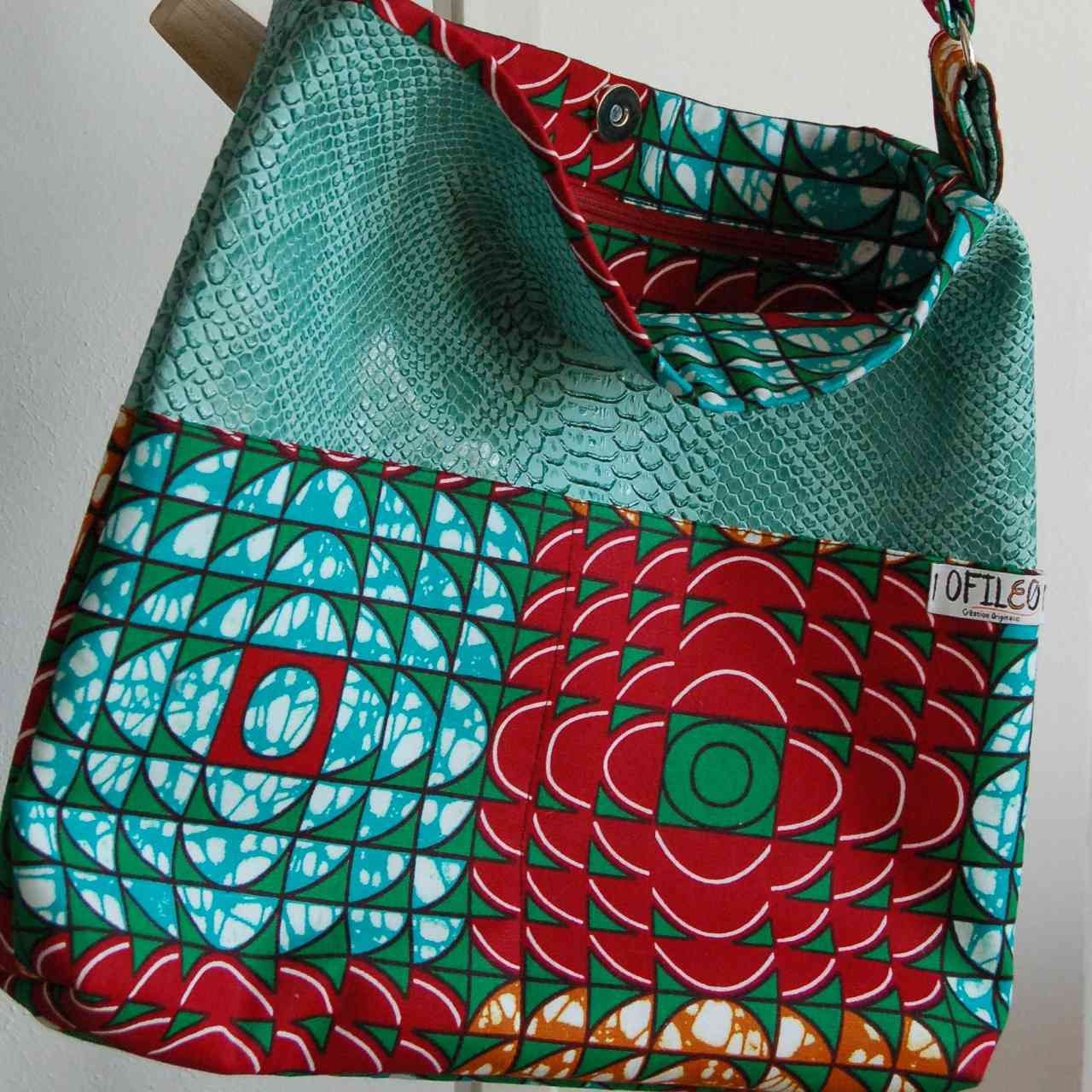 Le sac trapèze simili bleu et turquoise